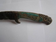 Скифский ятаганоподобный боевой нож с рукояткой в виде головы орла