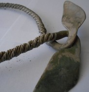 Орнаментированное  утолщенные концы шейной гривны, с рунами и свастикой