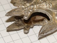 Серебряный с остатками позолоты наконечник ножен