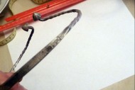 Витая шейная гривна с шишками на концах и рунической надписью