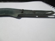 Заклепки на рукояти древнего бронзового ножа