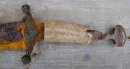 Сабля с остатками рогового покрытия рукояти и серебряной бутеролью