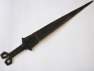 Скифский меч с антенным навершием в зверином стиле и бабочковидным перекрестьем и треугольным клинком