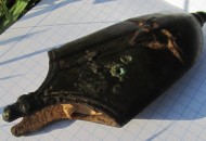 Древнерусский наконечник ножен со стилизованным изображением трилистника-пальметты
