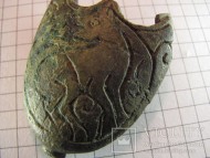 древнерусская бутероль с изображением зверя