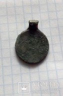 Древнерусская монетовидная подвеска с солярным амулетом