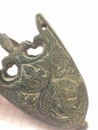 Древнерусский бронзовый наконечник ножен с растительным орнаментом