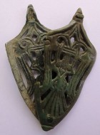 Древнерусский наконечник ножен с изображением птицы
