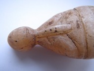 Каменная средневековая детская игрушка
