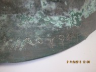 Надпись на древнем бронзовом шлеме