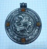 Снятый с продажи медальон со сценой терзания 19 век