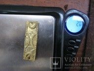 Золотая накладка ЧК. Изображен образно крест., общий вес 2 грм, до христианская эпоха Украины