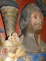 Геральдические украшение на шлеме, бацинет с наносником - середина 14 века