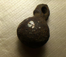 находка древнерусского кистеня ташуированного серебром