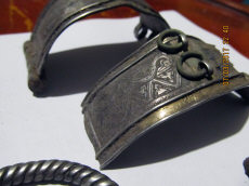 Древнерусские серебряные наручи, украшенные позолотой и чеканкой