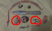 Хазарский трехлопастной наконечник стрелы вместе с кистенем, ножом, проколкой, серпом, амулетами, бубенчиками, и наконечником копья
