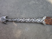 Кинжал арабского типа с серебряной рукоятью в виде переплетенных змей